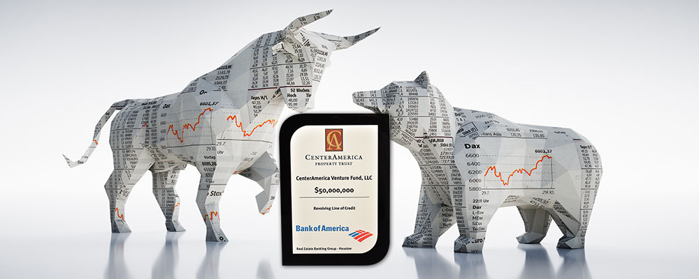 Bear and bull made of a financial newspaper with a financial tombstone award in the front.